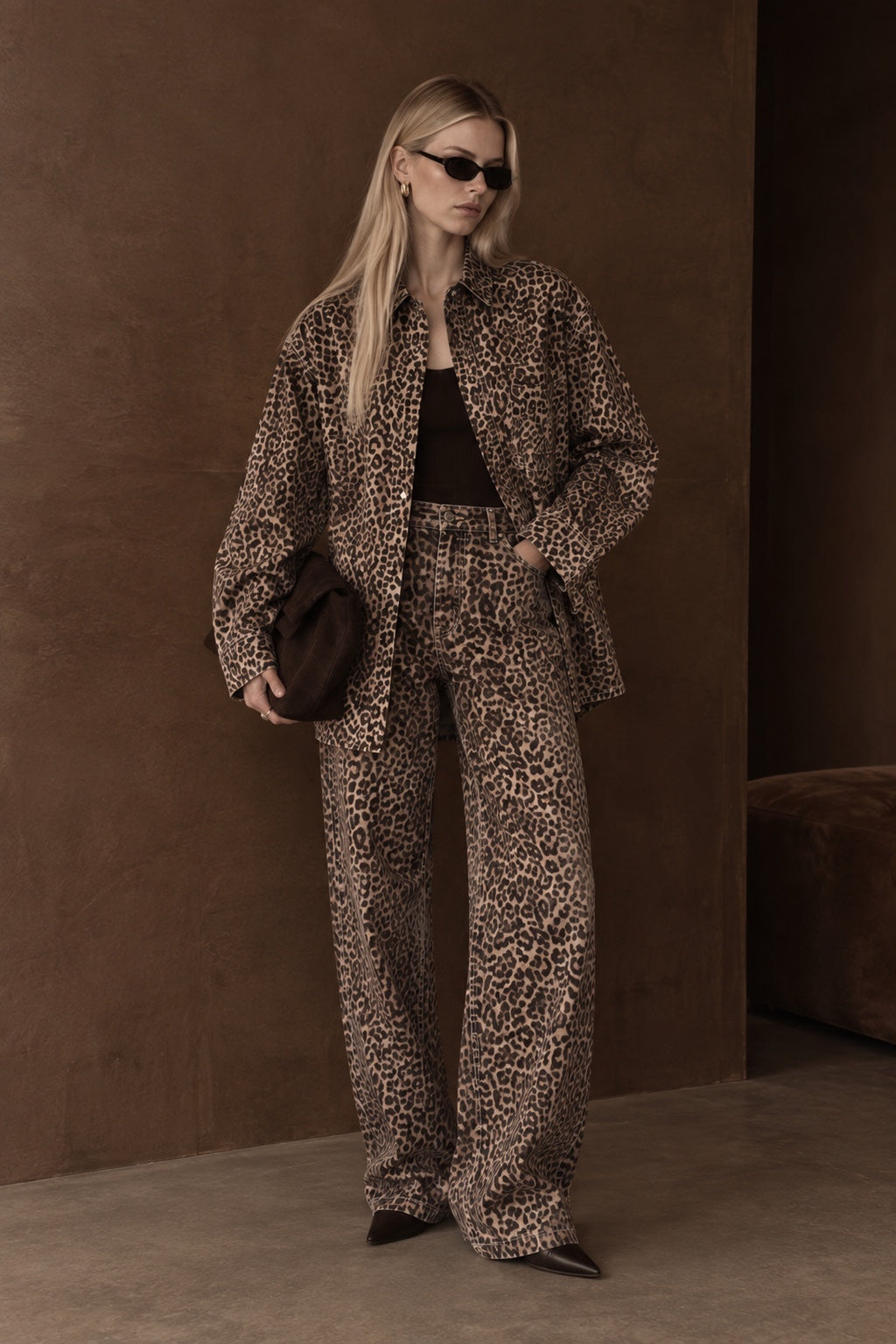Leopard print wide-leg jeans styled with matching leopard shirt