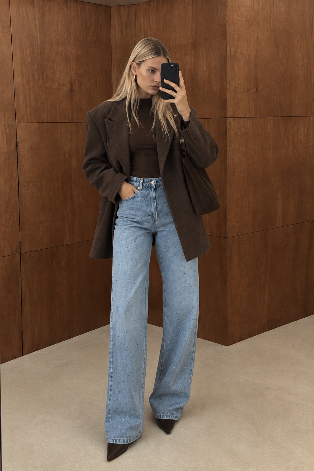 Light wash crystal embellished wide-leg jeans styled front view
