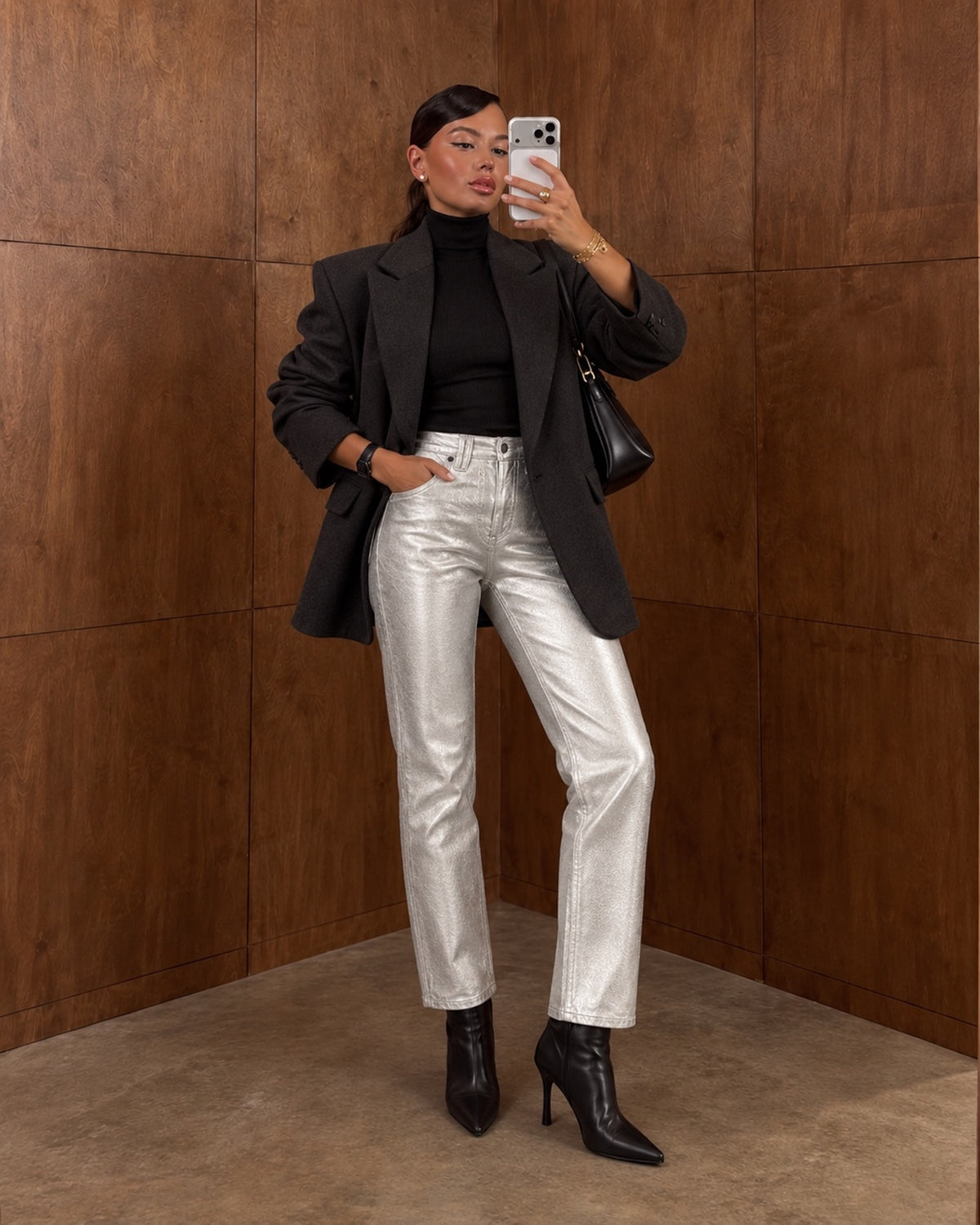 Metallic silver slim straight jeans styled with black blazer