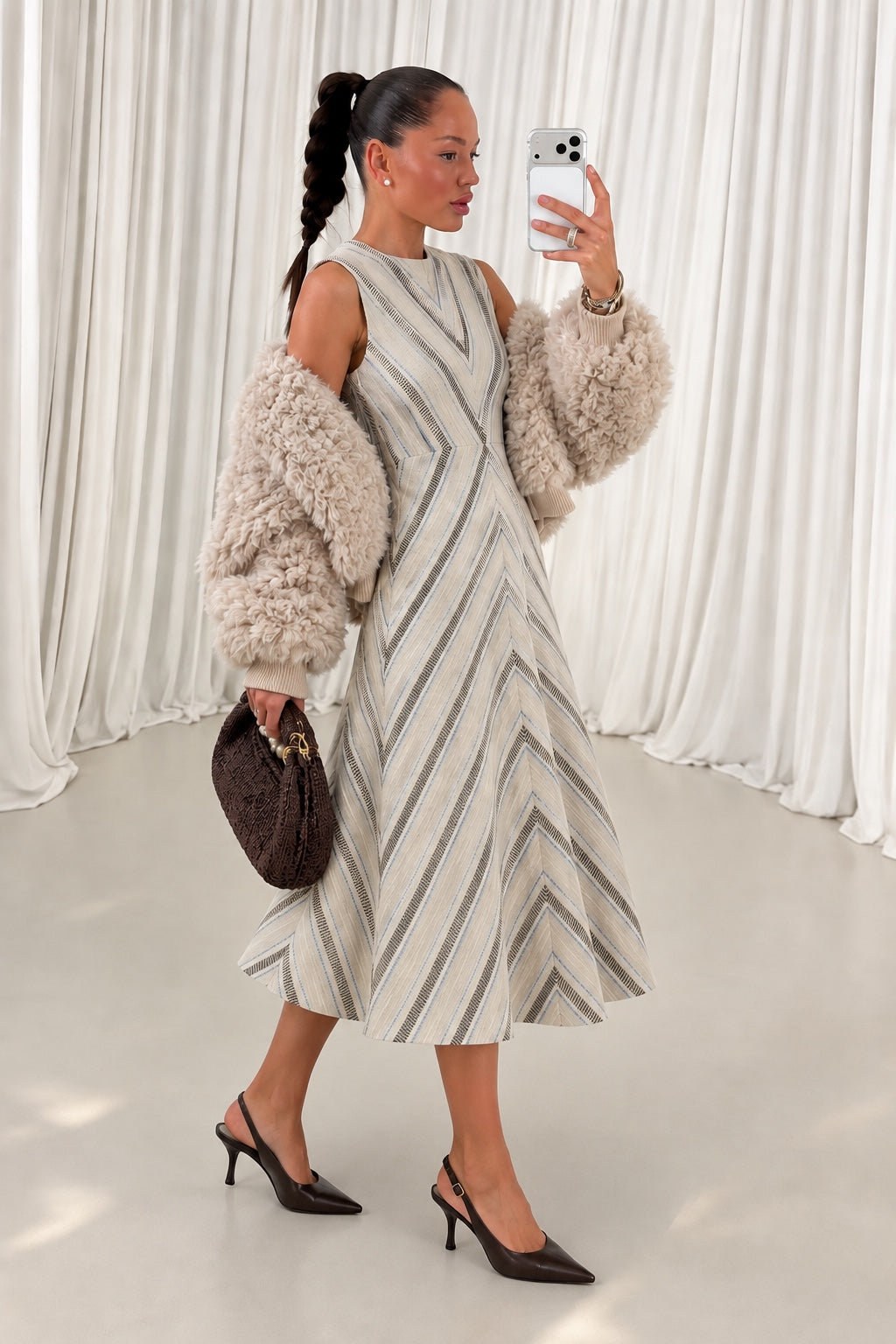 Textured stripe fit and flare midi dress styled with cream textured jacket